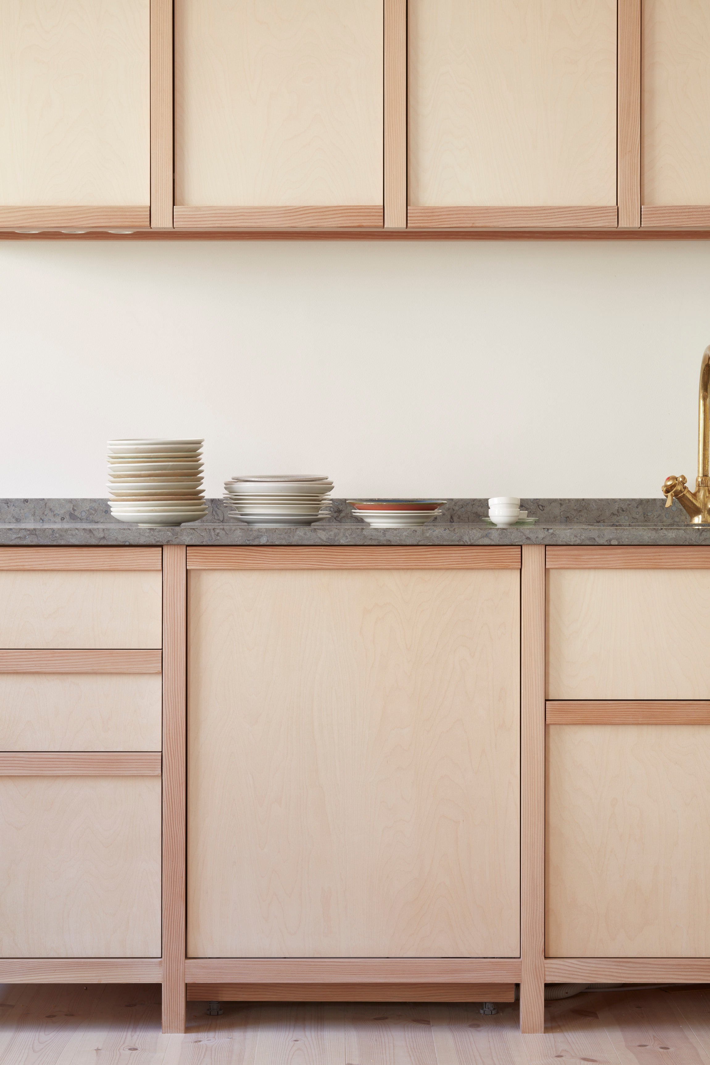 Kitchen in Oslo painted in colours designed by Daniel Rybakken for Blēo Collective