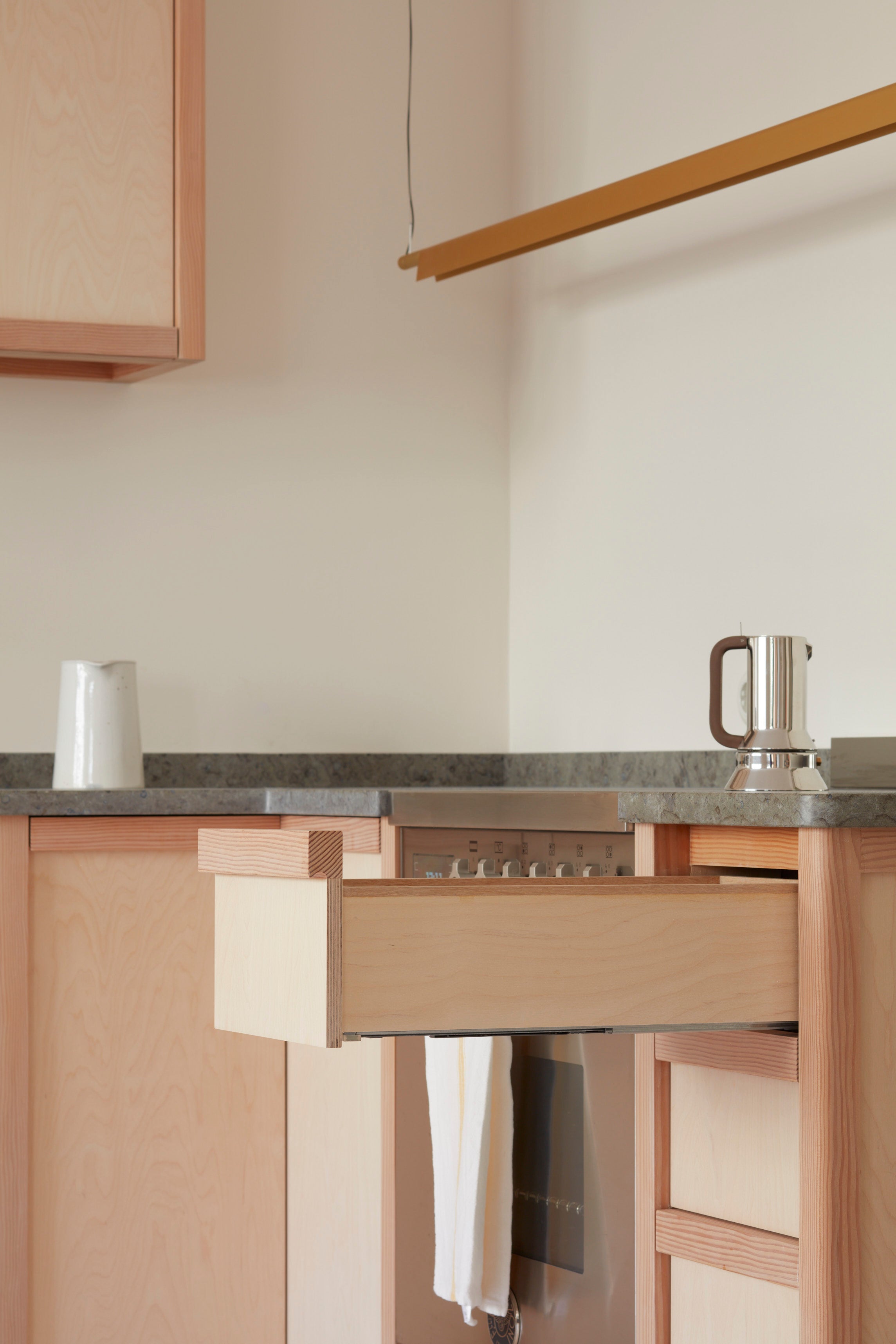 Kitchen in Oslo painted in colours designed by Daniel Rybakken for Blēo Collective